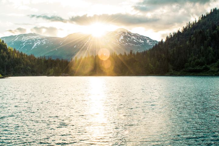 Sun over mountains in Kodiak, Alaska